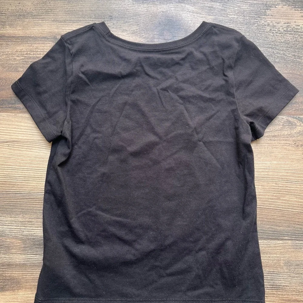 Old Navy Black Tee with Yellow Angel Lisa and Orange Pumpkin Small